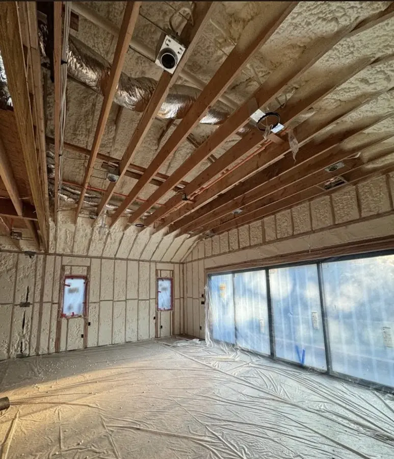 Interior walls and ceiling insulated with spray foam during new construction in Ellicott City